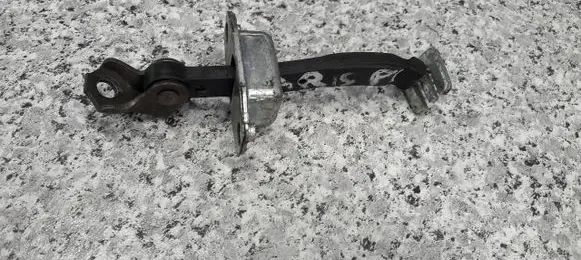 Toyota Yaris Rear door check strap stopper