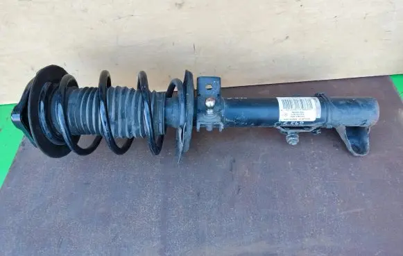 Mercedes-Benz E C207 W207 Front shock absorber with coil spring A2043202966 A2043201273