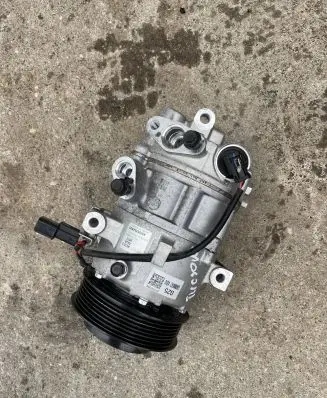 Hyundai Tucson IV NX4 Air conditioning (A/C) compressor (pump) 97701N7250