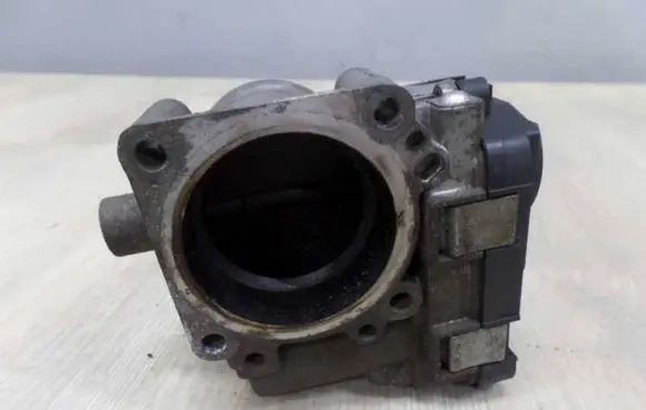 Volkswagen Touran I Throttle valve 03C133062A 43255