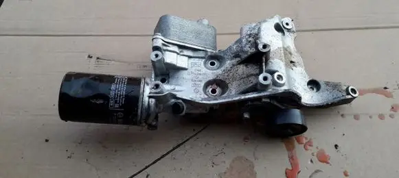Skoda Octavia Mk2 (1Z) Oil filter mounting bracket 06J903143S