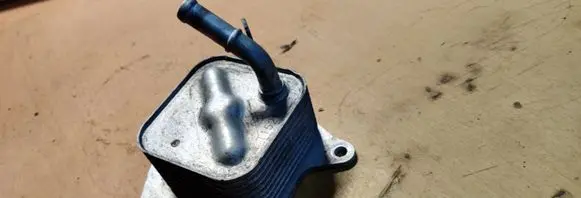 Mazda 2 Oil filter mounting bracket T15212
