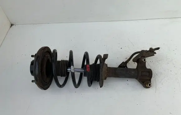 Nissan Primera Front shock absorber with coil spring