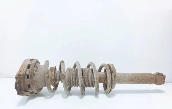 Nissan Almera N16 Rear shock absorber with coil spring 