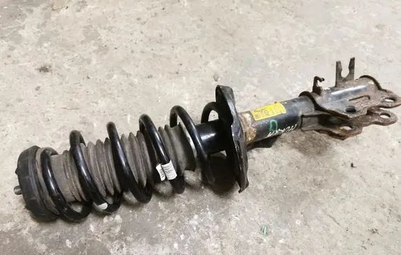 Front shock absorber with coil spring
