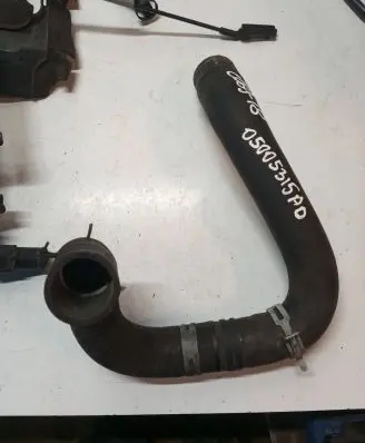 Chrysler Grand Voyager V Engine coolant pipe/hose 05005315AD