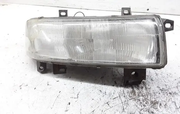Opel Movano A Headlight/headlamp 7700352106
