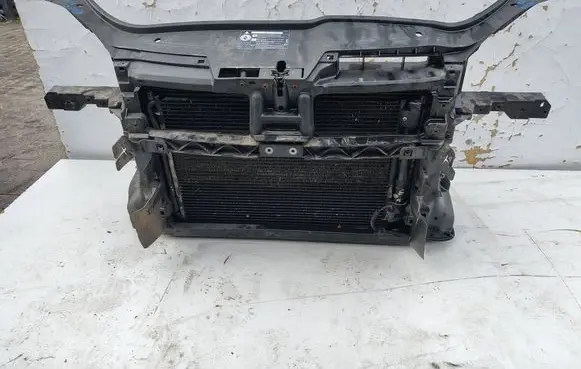 Radiator support slam panel