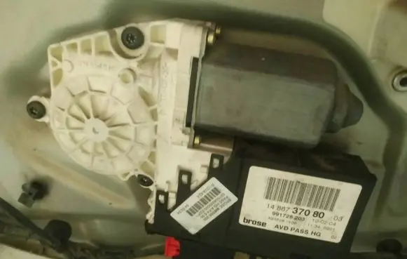 Front door window regulator motor
