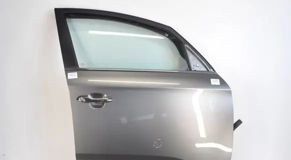 KIA Carens III Front door 