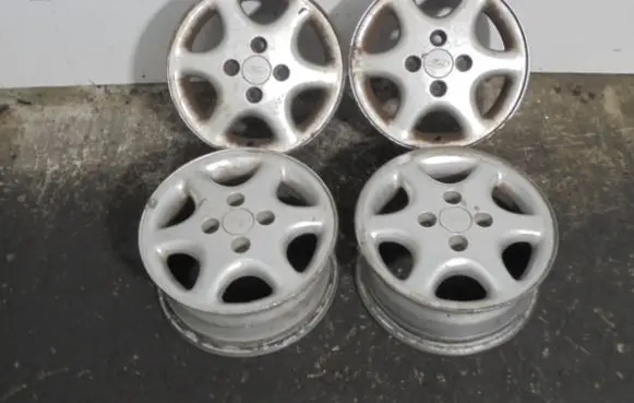 Ford Escort R12 alloy rim 95AB-AA