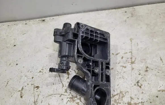 Thermostat/thermostat housing