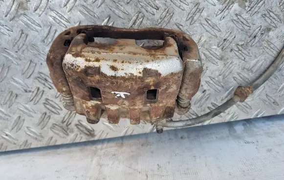 Subaru Impreza III Front brake caliper