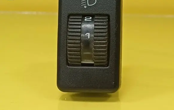 Volkswagen Golf IV Headlight level height control switch 357941333