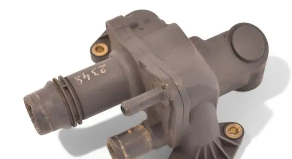 Thermostat/thermostat housing
