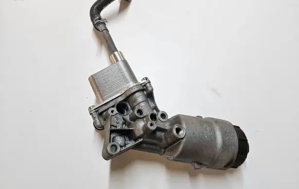Buick Encore I Oil filter mounting bracket 25195772 55583807 25195775