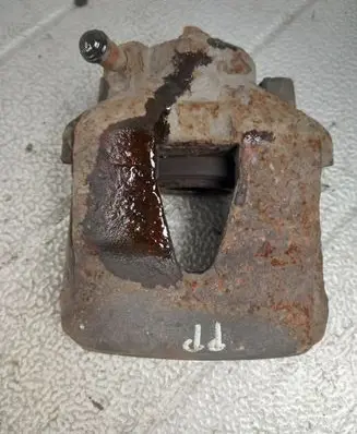 Volkswagen Golf IV Front brake caliper
