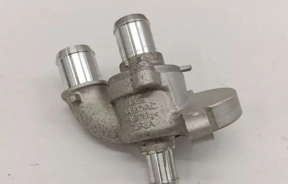 Thermostat/thermostat housing