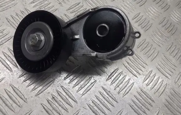 Opel Astra H Alternator belt tensioner pulley 