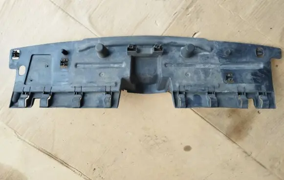 Engine bonnet/hood lock trim molding