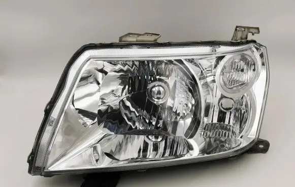 Suzuki Grand Vitara II Headlight/headlamp 10059076