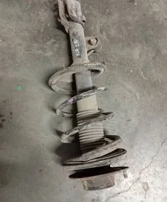 KIA Sportage Front shock absorber with coil spring