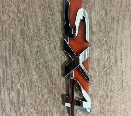 Suzuki SX4 Manufacturers badge/model letters 7783179J000PG