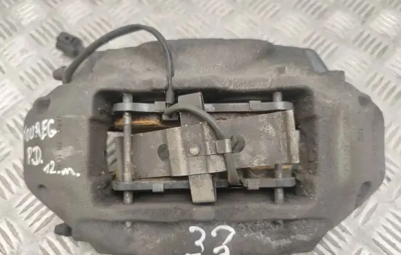Volkswagen Touareg II Front brake caliper 7P6615106AE