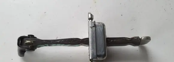 Toyota Yaris Front door check strap stopper