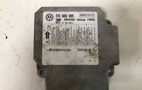 Volkswagen Touran I Airbag control unit/module 1T0909605