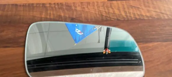 Volkswagen Golf IV Wing mirror glass 