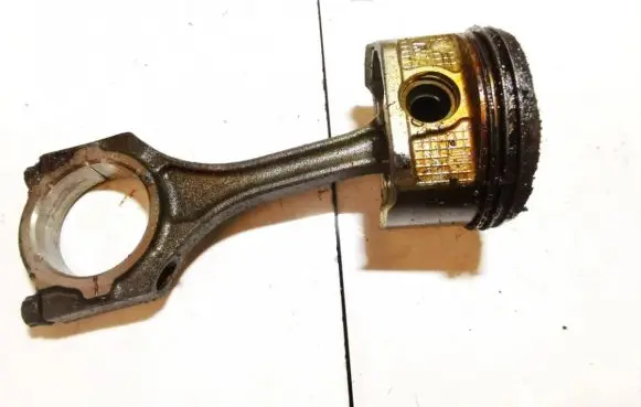 Piston with connecting rod