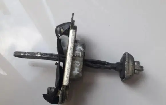 KIA Sephia Front door check strap stopper 