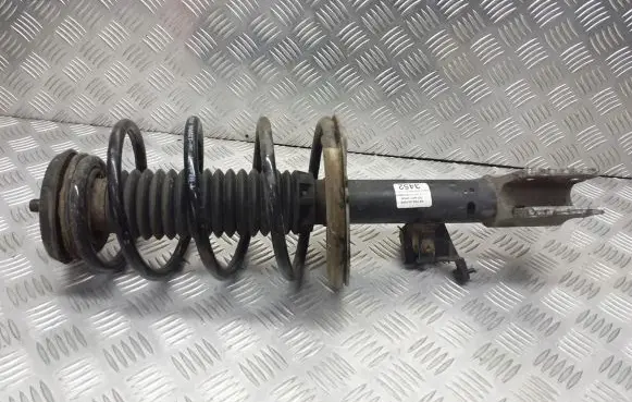 Citroen C4 I Front shock absorber with coil spring