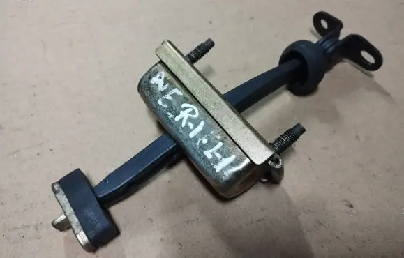 Chrysler Neon II Front door check strap stopper