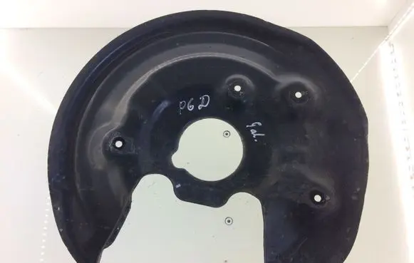 Volkswagen PASSAT B6 Rear brake disc plate dust cover 5N0615612C