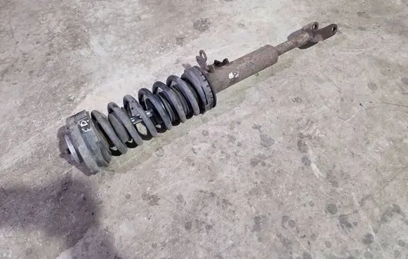 Front shock absorber with coil spring