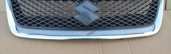 Suzuki Grand Vitara II Front bumper upper radiator grill