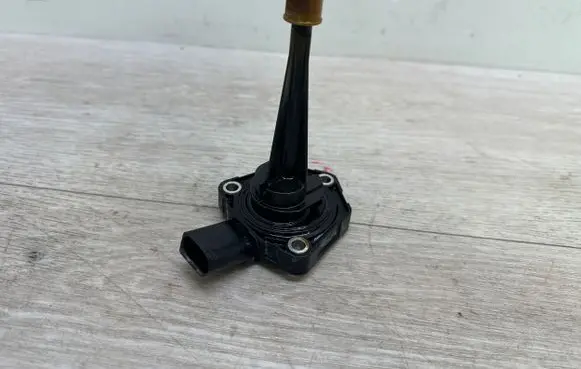 Oil level dip stick