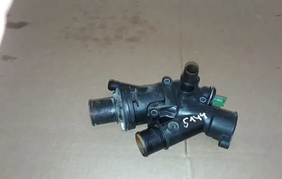 Thermostat/thermostat housing
