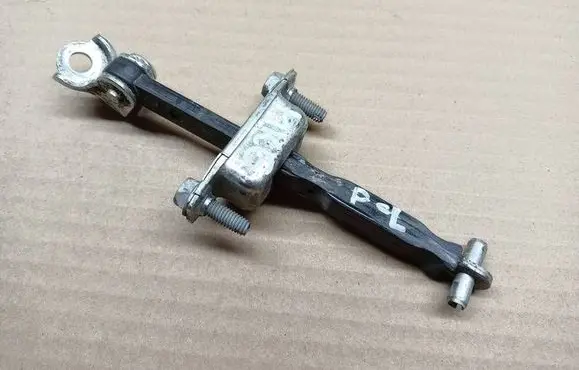 Suzuki Swift I Front door check strap stopper 