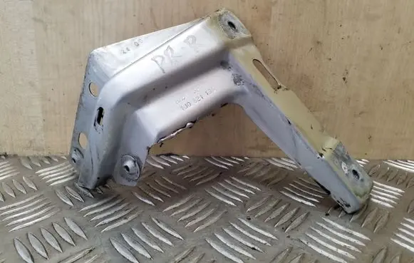 Volkswagen Golf IV Fender mounting bracket 1J0821136