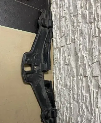 Engine bonnet/hood lock trim molding
