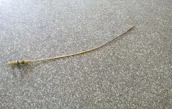 Oil level dip stick