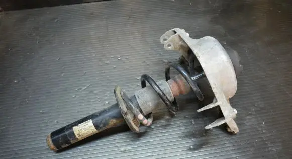 Audi A4 S4 B8 8K Front shock absorber with coil spring 8T0413031AF