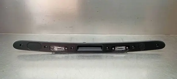 Trunk door license plate light bar