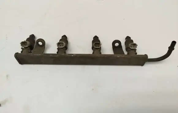 Mitsubishi Colt Fuel injectors set MR988977 MN143973