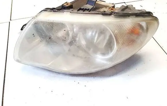 Chrysler Grand Voyager IV Headlight/headlamp 04857831AC