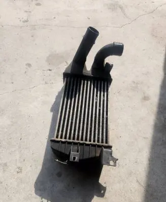 Opel Zafira B Intercooler radiator 13213402