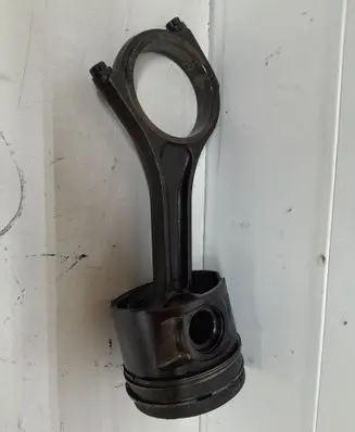 Piston with connecting rod